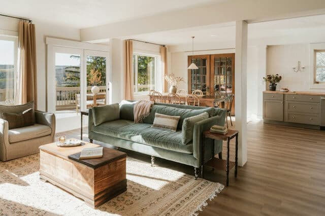 Living room with floor-to-ceiling windows and a fireplace